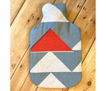 Load image into Gallery viewer, Quilted Piecework; blue and red hot water bottle.

