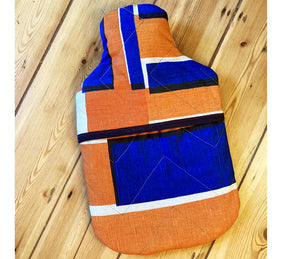 Quilted Lattice; orange and blue hot water bottle.