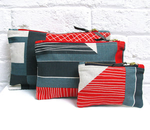 Abstract Square pouch: Red, Navy, Blue