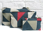 Load image into Gallery viewer, Plane Curve pouch: Pink, Grey, Blue
