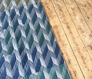 Optic patchwork quilt: Green, Blue