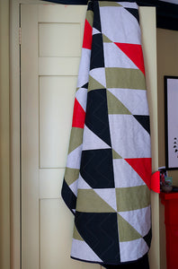 Pennon: Churlish Green, Red and Slate Quilted Bedspread