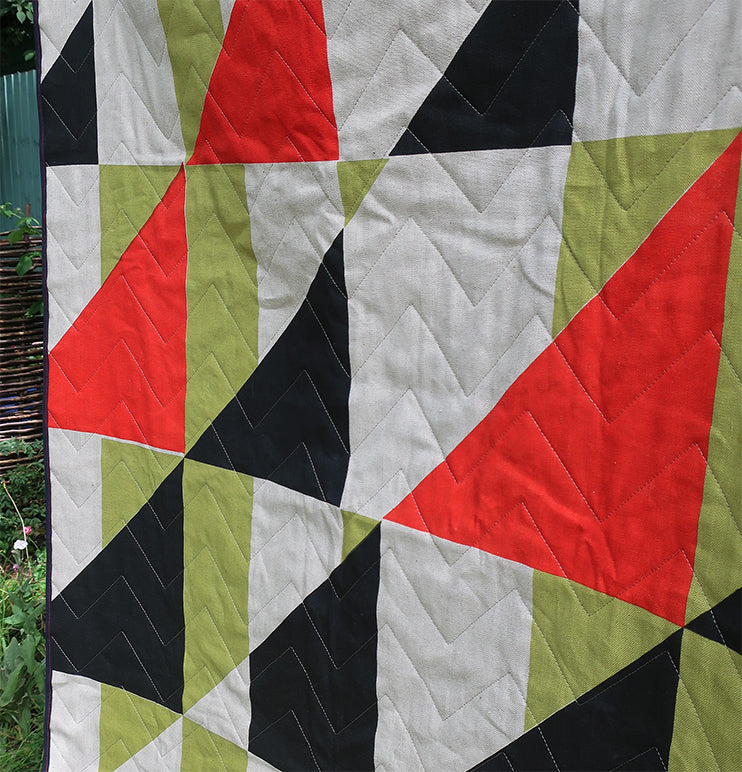 Pennon: Churlish Green, Red and Slate Quilted Bedspread