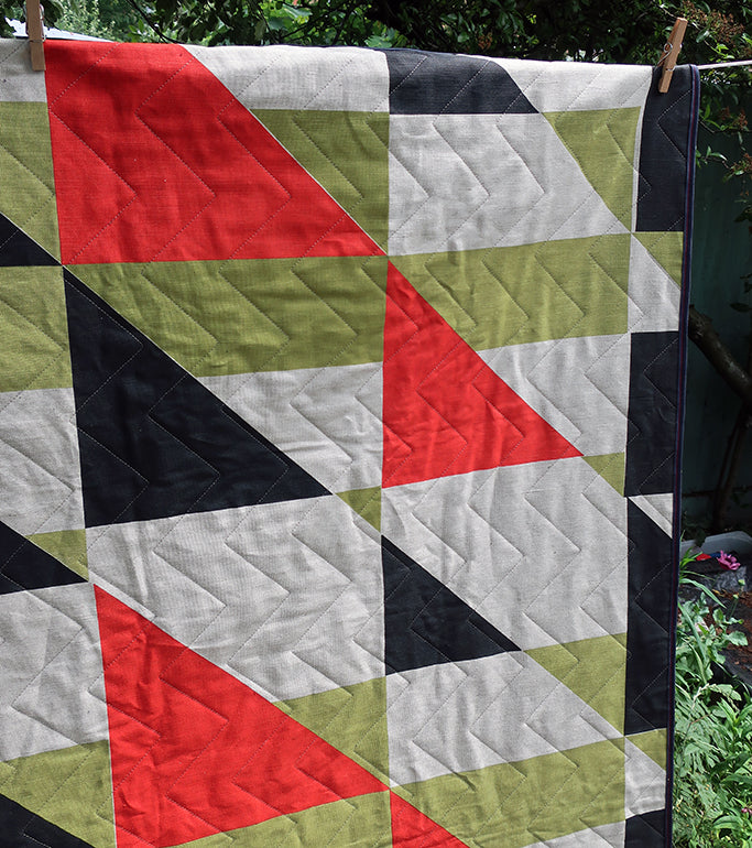 Pennon: Churlish Green, Red and Slate Quilted Bedspread